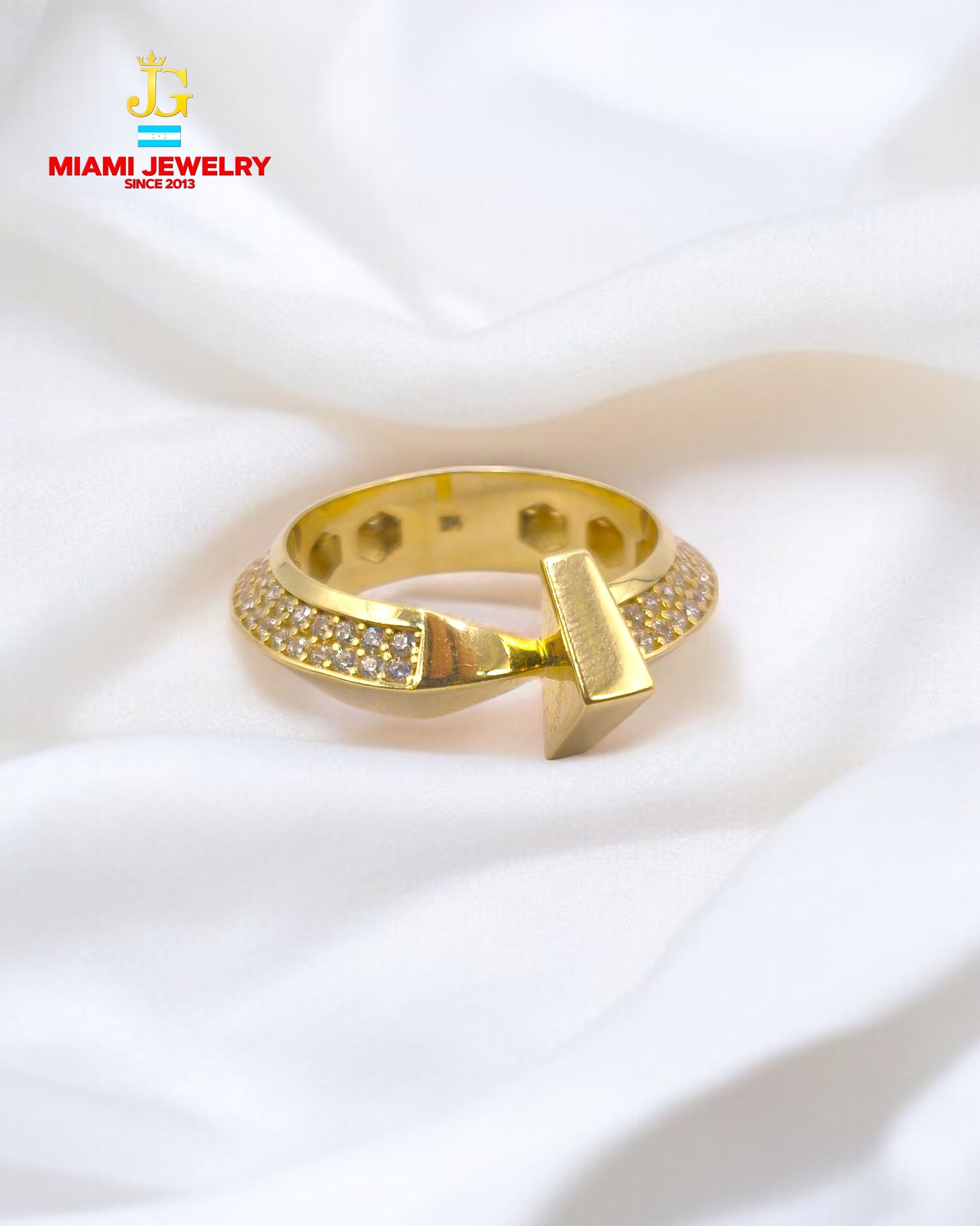 Solid 14k yellow gold with white zirconia gemstones.