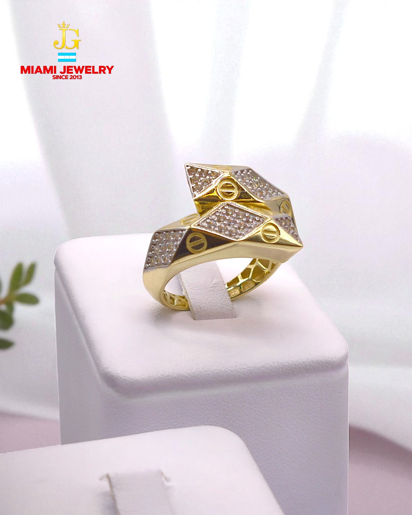 Solid 14k yellow gold with white zirconia gemstones.