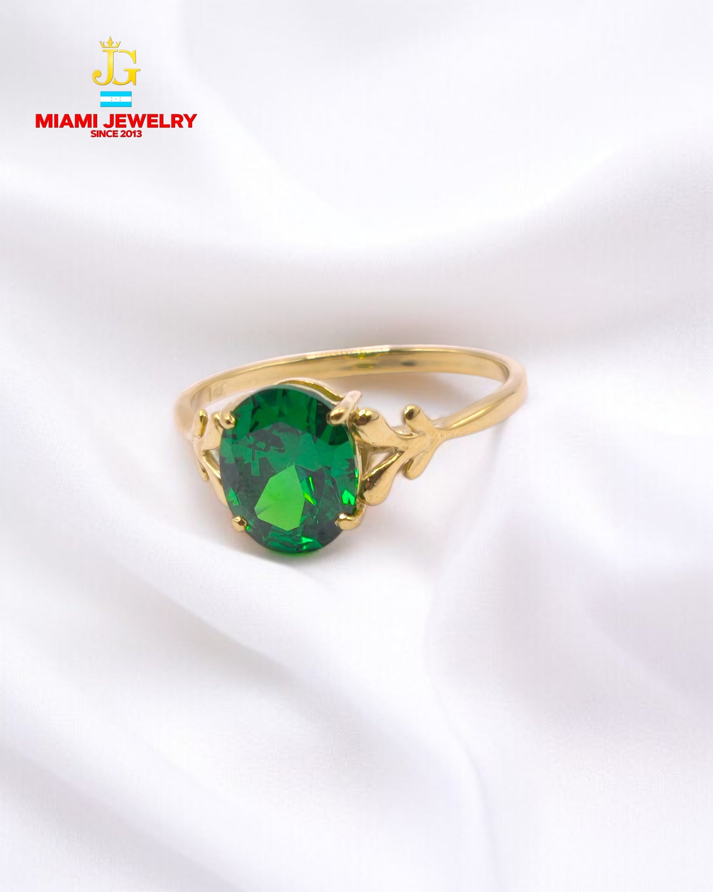 14k solid yellow gold oval-cut emerald green gemstone.