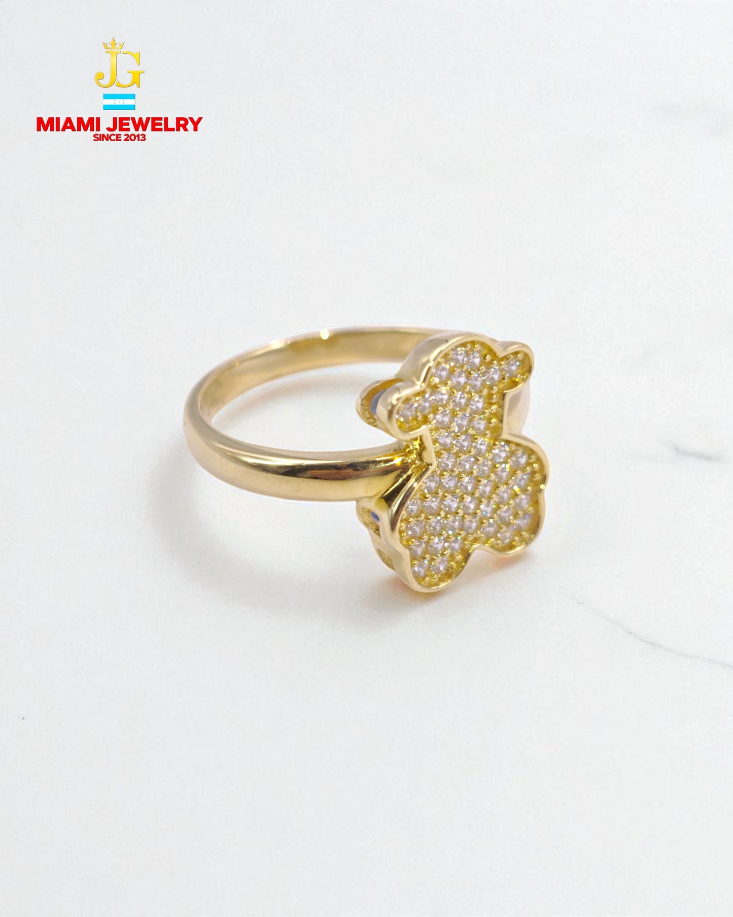 14k yellow gold bear ring with white gemstones