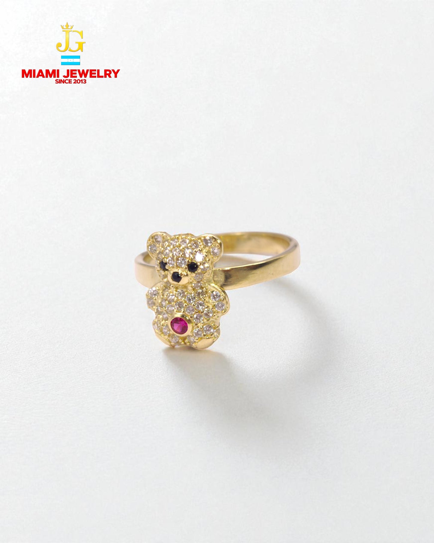 14k yellow gold bear ring with white gemstones