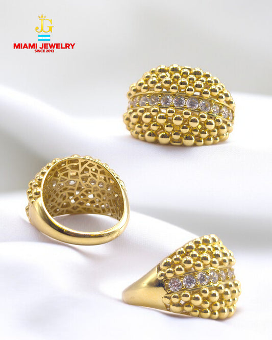 14k yellow gold ring textured white zirconia gemstones.