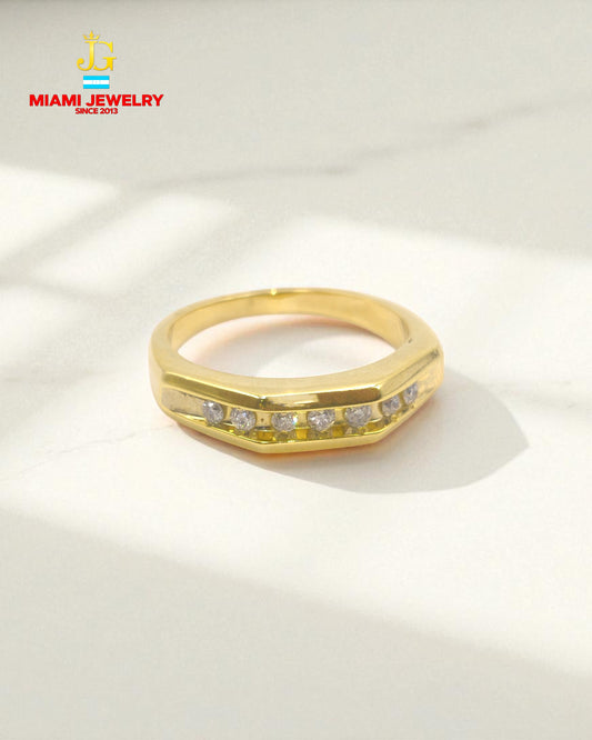 Solid 14k yellow gold wedding ring band with white-zirconia gemstones .