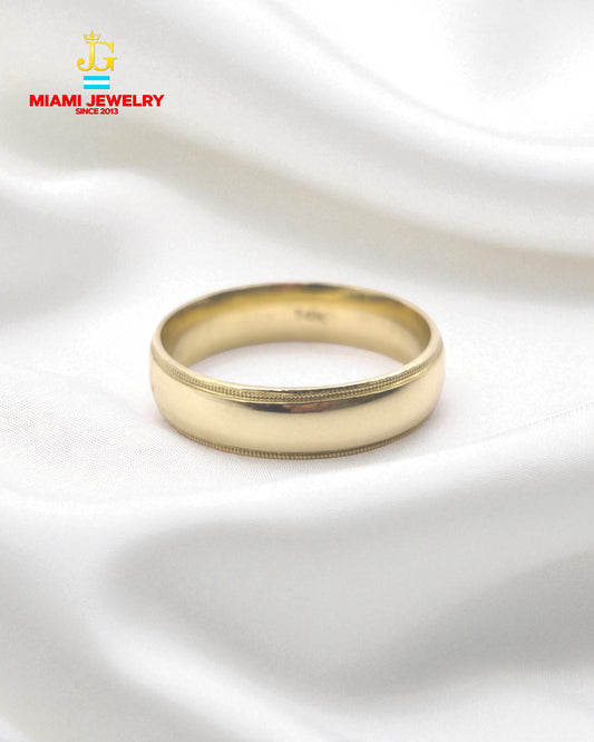 Solid 14k yellow gold wedding band.